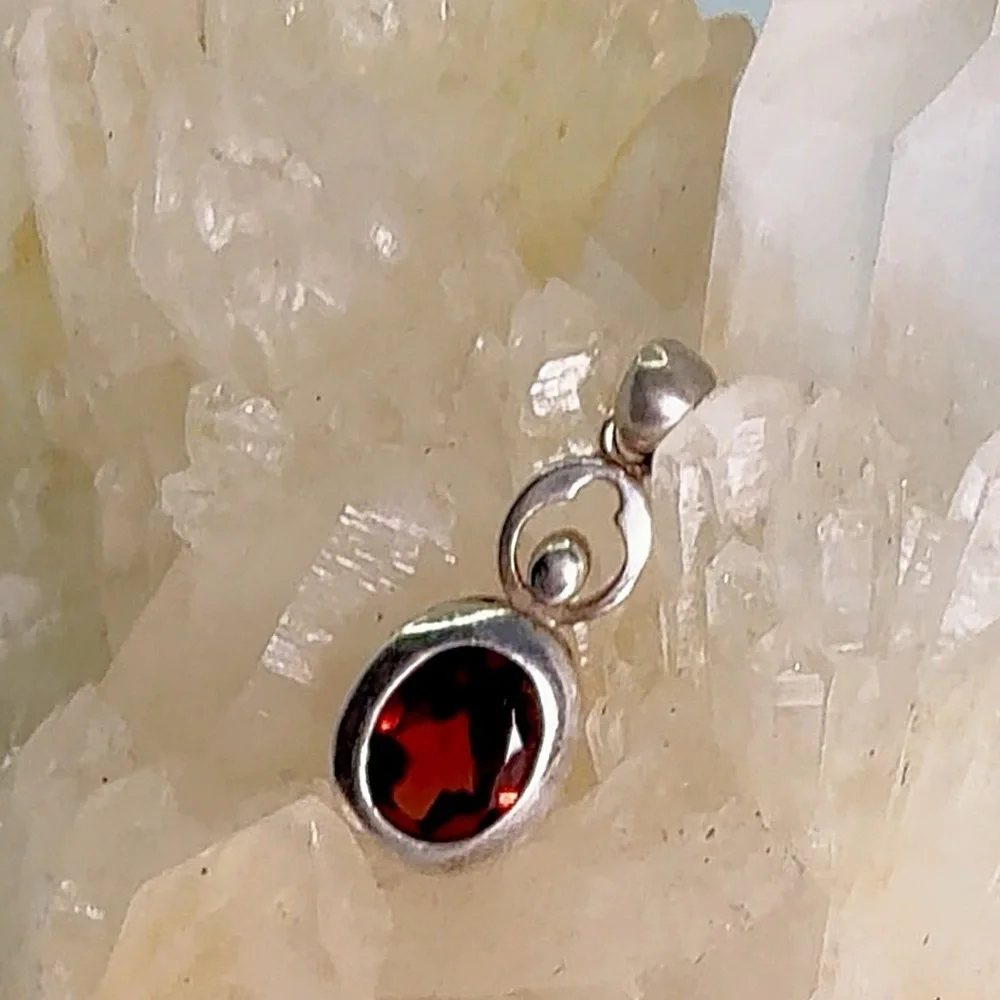 Elegant Silver and Red Gemstone Pendant